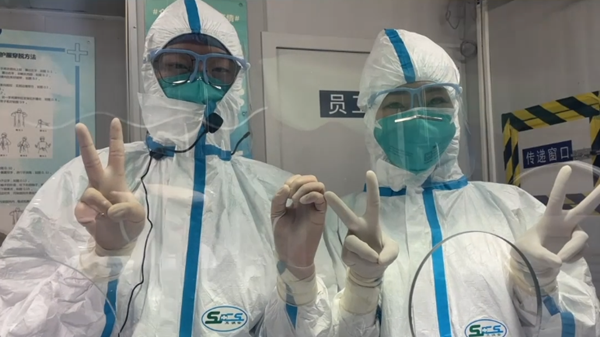 视频 | 申城24小时核酸检测点 医生们在岗位上跨年
