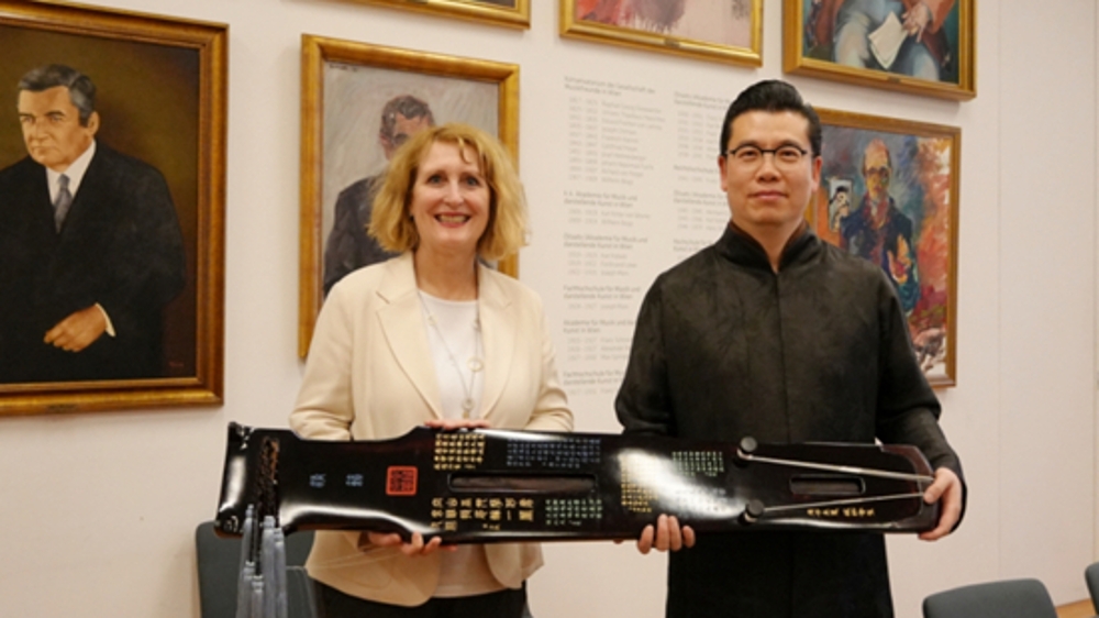 上海古琴演奏家杨致俭复原故宫藏古琴，五张珍品入藏欧洲著名博物馆
