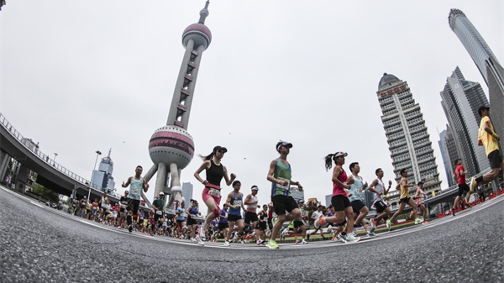 “8岁”上海半马今晨开跑 男女组均打破赛会纪录