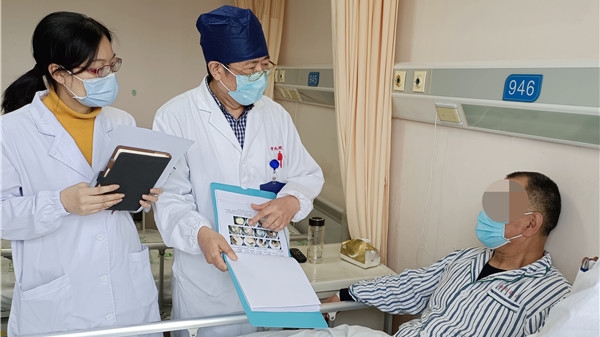 市北医院消化内科主任、内镜中心主任熊文坚：发现一例早癌 挽救一条生命