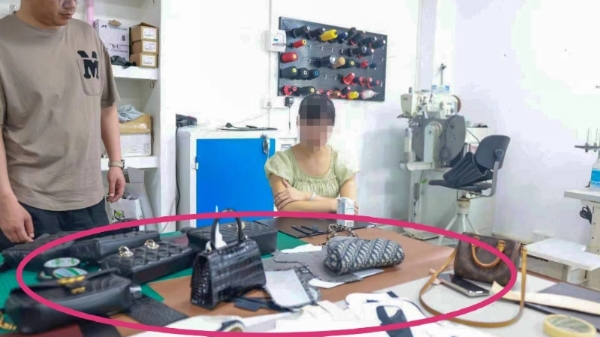 一只假冒名牌手提包牵出一群犯罪团伙 崇明警方全链条一举捣毁