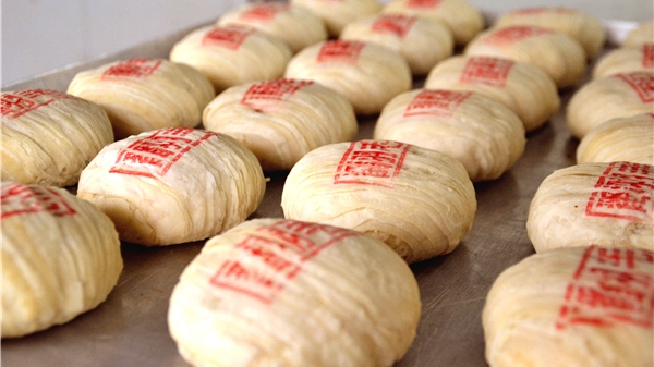 非遗食品制作技艺传承八代百年 中华老字号悦来芳追求“至味为上”